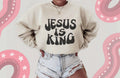 Jesus Is King Graphic on Gildan Softstyle Sand Shirt – Graphic Tee, Long Sleeve & Crewneck.